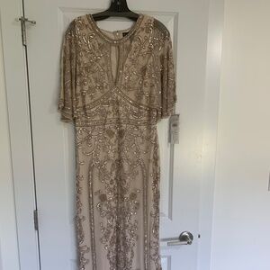 Champagne , cape beaded gown